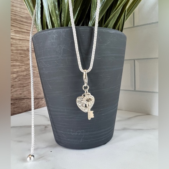 Guess Jewelry - 3/$25 Guess Modern Silver & Crystal Detailed Key and Lock 32” Adj Necklace